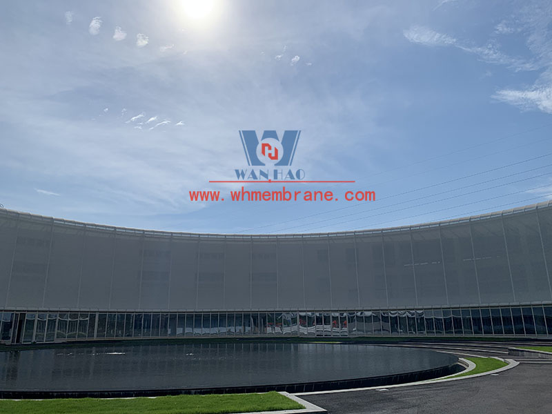PTFE mesh membrane structure project on the facade of a new factory building PTFE mesh membrane structure project on the facade of a new factory building