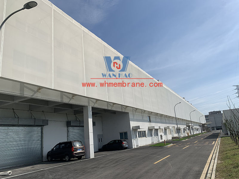PTFE mesh membrane structure project on the facade of a new factory building PTFE mesh membrane structure project on the facade of a new factory building