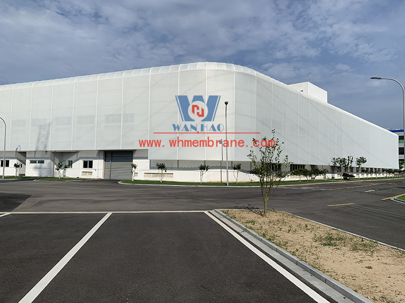 PTFE mesh membrane structure project on the facade of a new factory building PTFE mesh membrane structure project on the facade of a new factory building