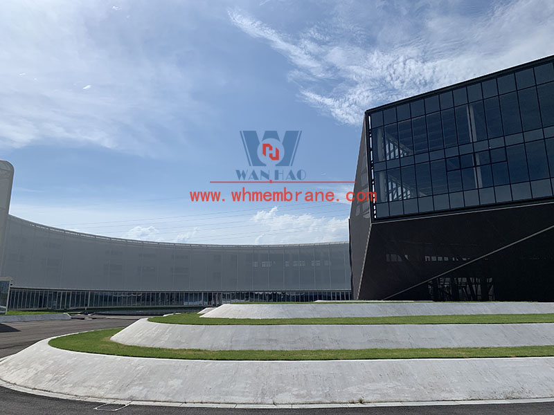 PTFE mesh membrane structure project on the facade of a new factory building PTFE mesh membrane structure project on the facade of a new factory building