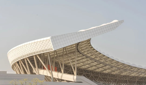 PTFE Membrane-Structured Sports Center Integrated into the Landscape